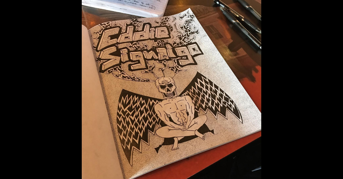 A self-portrait by Eddie Signaigo