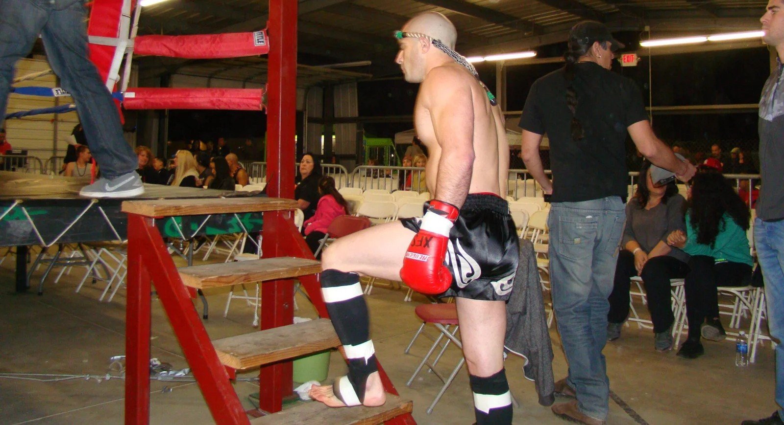 Eddie Signaigo entering the ring for a muay thai fight.