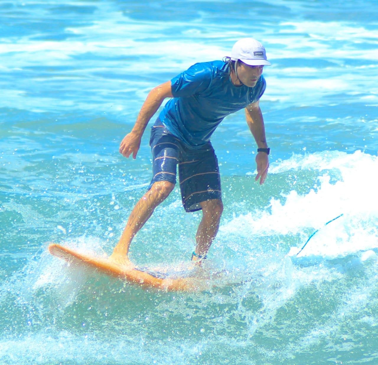 Eddie Signaigo surfing in Manzanillo Bay. Cover for ''What does it mean to be a professional?" blog.