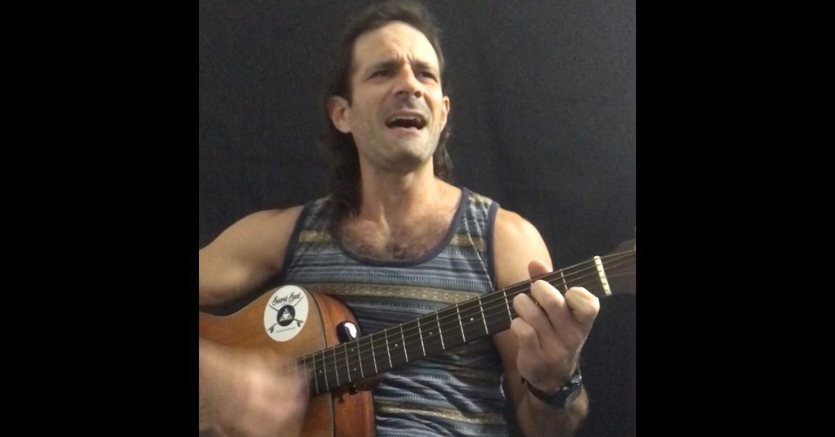 Eddie Signaigo playing Bailando Solo by Los Bunkers on guitar.