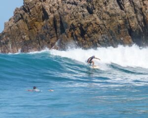 Eddie Signaigo surfing at a secret spot called Rasta Point.