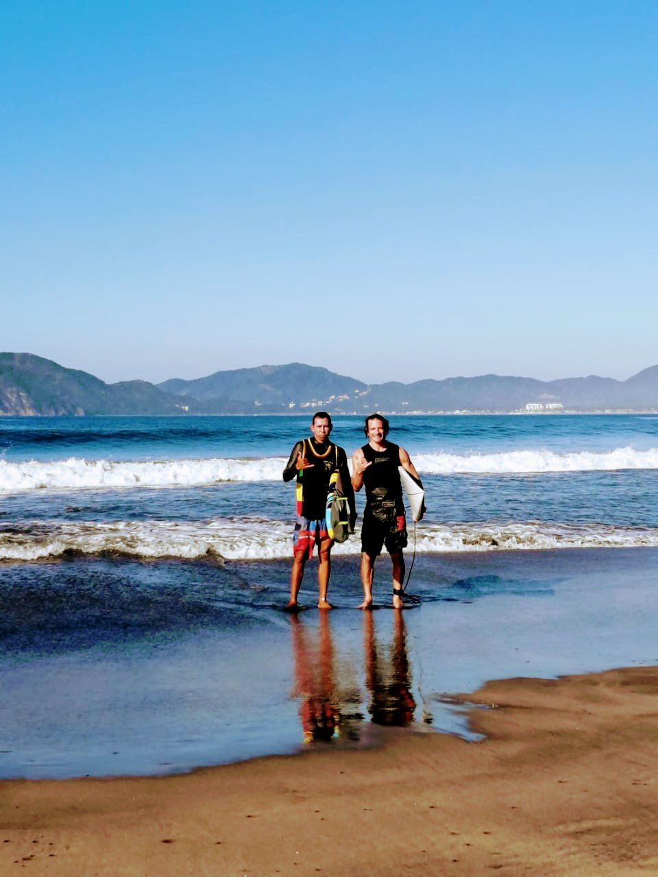 Me with my surfing coach, Roscoman