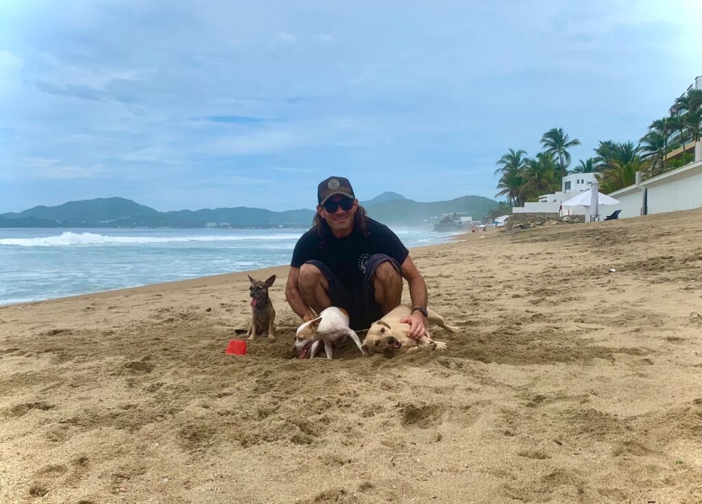 Me with Queenie, Elvis, and Maya at the beach.