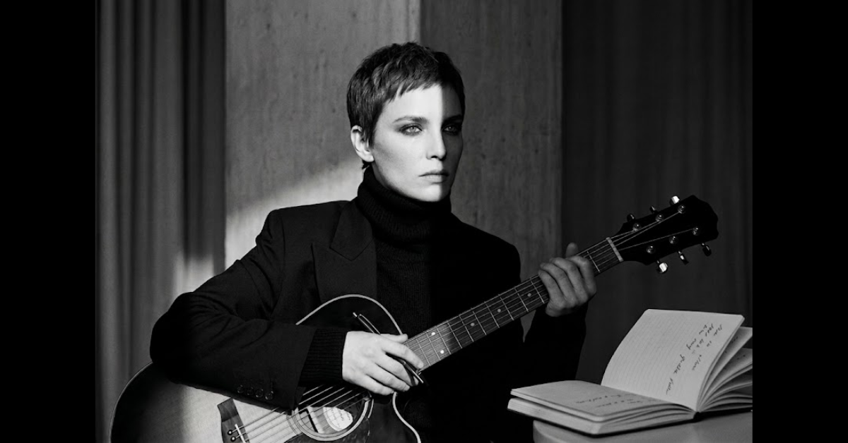 Memory of a Ghost Poem Cover Image - Girl with a guitar and a notebook