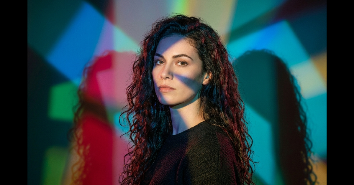 Never Were Poem Cover Image - Woman Technicolor Headshot