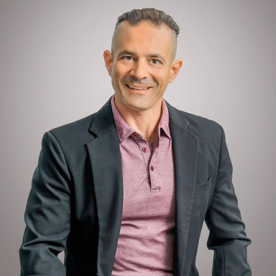 Back Cover Headshot Photo (square) Eddie Signaigo Headshot